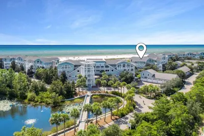 an aerial view of a resort with the ocean in the background at Crossings at WaterSound B105 in Watersound Beach