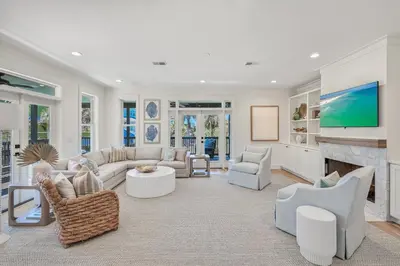 a living room with a couch and a fireplace at 48 Geoff Wilder in Inlet Beach