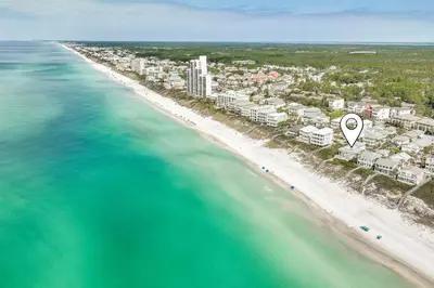 an aerial view of a beach with a resort at The Flying Pig in Santa Rosa Beach