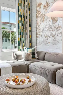 a living room with a couch and a table at 30A Showhouse in Rosemary Beach