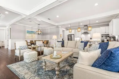 a living room with a couch and a table at Nature and the Beach in Santa Rosa Beach