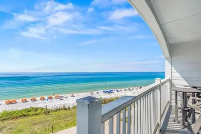 a balcony with a view of the beach at Blue Tide 6B in Inlet Beach