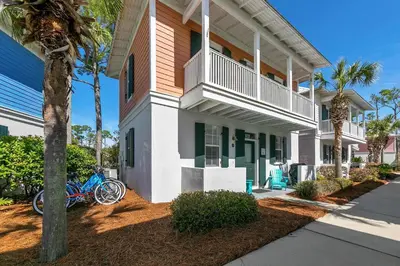 a blue bike parked in front of a house at Seagrove Bungalow 110 - One Ten Again in Santa Rosa Beach