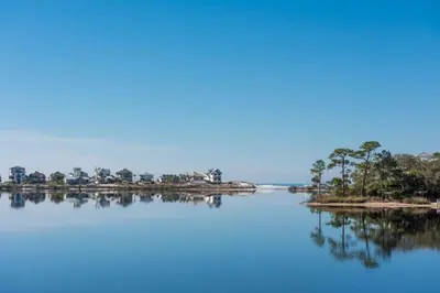 an island in the middle of a large body of water at Sea Turtle Cottage in Santa Rosa Beach