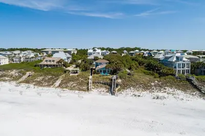 an aerial view of a beach with houses and condos at Sea Turtle Cottage in Santa Rosa Beach