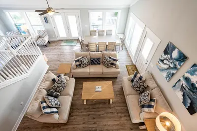 an overhead view of a living room with couches at 50 Sea Turtle in Santa Rosa Beach
