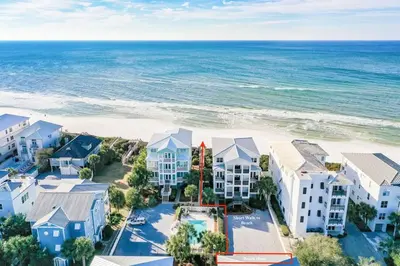 an aerial view of a resort with the beach at Gulf Side Condo Seagrove Beach Community Pool in Santa Rosa Beach