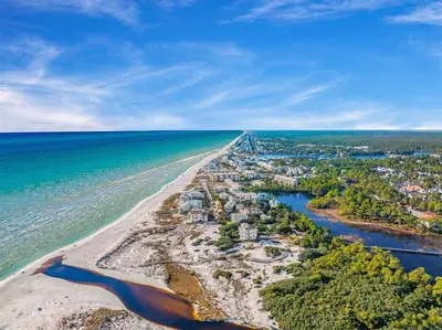 an aerial view of the shoreline of a beach at Gulf Side Condo Seagrove Beach Community Pool in Santa Rosa Beach