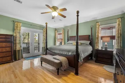 a bedroom with a bed and a ceiling fan at 30A Beach House - The Hemingway by Panhandle Getaways in Seacrest