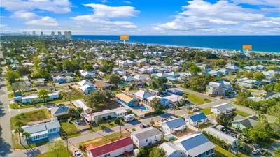 an aerial view of a small town next to the ocean at Sunshine House! 3BR 2BA Sleeps 9! Your perfect retreat for comfort and style in Panama City