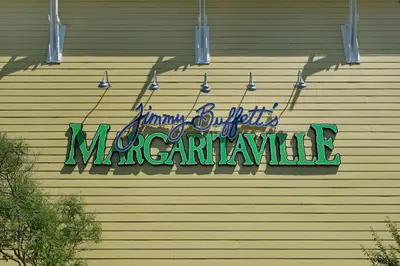 a neon sign on the side of a building at Laguna Haven! 3BR 2BA Sleeps 7! Your perfect escape! in Panama City Beach