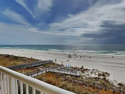 a view of the beach from a balcony of a beach at Majestic Beach Towers I #312 in Panama City Beach