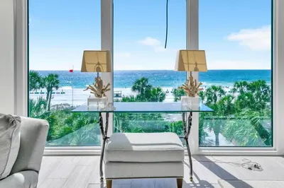 a glass table with a view of the ocean at Sterling Beach #301 in Panama City Beach
