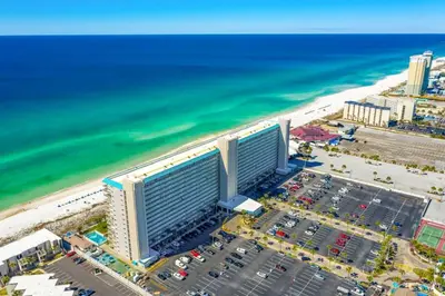an aerial view of the beach and buildings at The Summit 321 in Panama City Beach