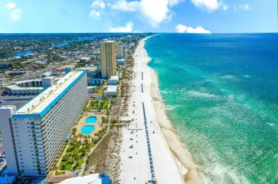 an aerial view of the beach and the ocean at The Summit 321 in Panama City Beach