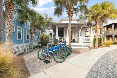 a group of bikes parked in front of a house at Greenway Loop by 30A Escapes in Rosemary Beach