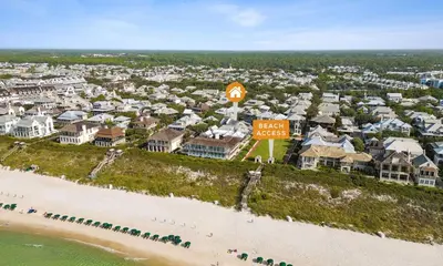 an aerial view of a resort with a beach and a sign at Pappas Cottage by 30A Escapes in Rosemary Beach