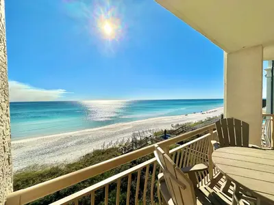 a balcony with a view of the beach at HP 36W Condo by 30A Escapes in Rosemary Beach