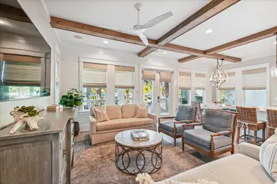 a living room with a couch and chairs and a table at At Ease by 30A Escapes in Rosemary Beach