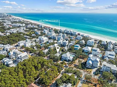 an aerial view of a beach with condos at Sand Pointe by 30A Escapes in Inlet Beach