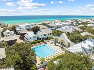 an aerial view of a residential neighborhood with a swimming pool at Tuscan Blue by 30A Escapes in Rosemary Beach