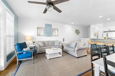 a living room with couches and a ceiling fan at Hidden Gem #6 by 30A Escapes in Seacrest
