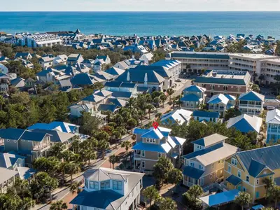 an aerial view of a resort town with blue roofs at 100 Lifeguard Loop East by 30A Escapes in Rosemary Beach