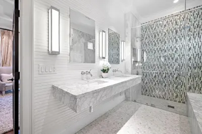 a white bathroom with a large sink and a shower at 103 E Kingston by 30A Escapes in Rosemary Beach