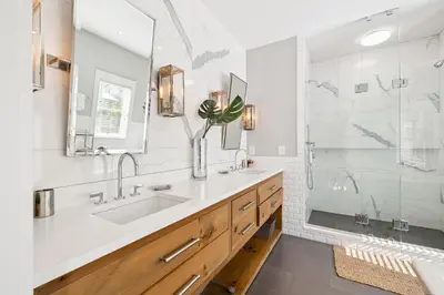 a bathroom with a sink and a shower at Casablanca by 30A Escapes in Rosemary Beach