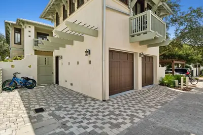 a bike parked in front of a house at Summer Cottage by 30A Escapes in Rosemary Beach