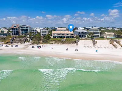 an aerial view of a beach with a blue balloon at Mermaid Cove by 30A Escapes in Seacrest