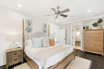 a bedroom with a bed and a ceiling fan at 21 Hamilton Lane by 30A Escapes in Rosemary Beach
