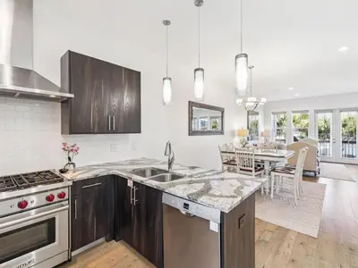 a kitchen with a sink and a counter top at CaSEAta by 30A Escapes in Rosemary Beach
