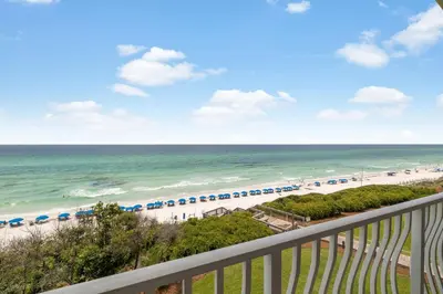 a view of a beach with umbrellas and the ocean at Beachfront Bliss On 30A by 30A Escapes in Seacrest