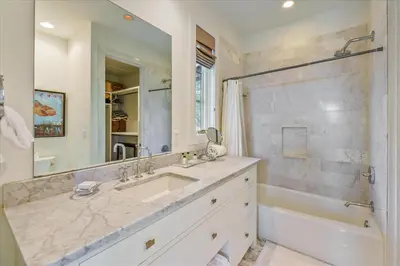 a bathroom with a large sink and a shower at Timeless by 30A Escapes in Rosemary Beach