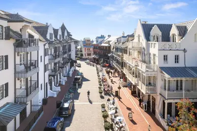 an aerial view of a city street with buildings at Sands Cottage Carriage by 30A Escapes in Rosemary Beach