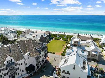 an aerial view of the beach with houses and the ocean at Ocean`s Six by 30A Escapes in Rosemary Beach