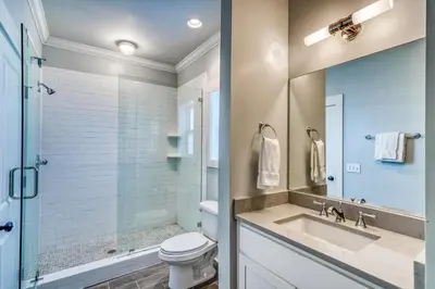 a bathroom with a sink and a toilet and a shower at As Good as it Gets by 30A Escapes in Rosemary Beach