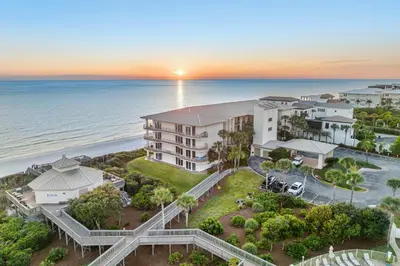 an aerial view of a resort on the beach at sunset at HP 34E On the Gulf by 30A Escapes in Rosemary Beach