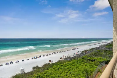 a view of the beach from the balcony of a condo at HP 34E On the Gulf by 30A Escapes in Rosemary Beach