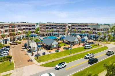 an aerial view of a town with cars parked on the street at HP 24W Condo by 30A Escapes in Rosemary Beach