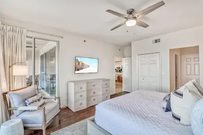 a bedroom with a bed and a ceiling fan at HP 422 Blue Haven by 30A Escapes in Rosemary Beach