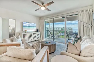 a living room with couches and a ceiling fan at HP 422 Blue Haven by 30A Escapes in Rosemary Beach