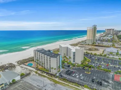 an aerial view of the beach and buildings at Moondrifter 207 in Panama City Beach
