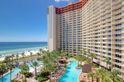 an aerial view of a resort with a pool and the beach at Shores of Panama 1410 - Seaside Retreat in Panama City Beach