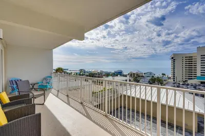 a balcony with a view of the ocean at Panama City Beach Condo - Walk to the Ocean! in Panama City Beach