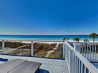 a balcony with a view of the beach at Charline Beachside Villa in Panama City Beach