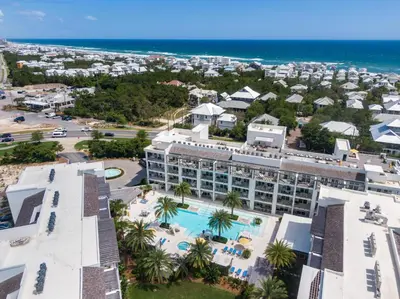 an aerial view of the hotel and the ocean at Texas Two Step by 30A Escapes in Rosemary Beach