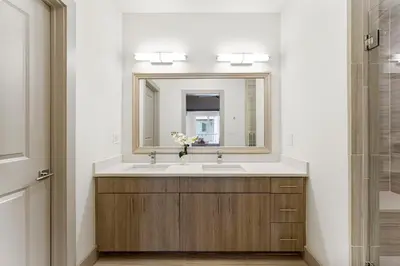 a bathroom with a sink and a mirror at The Pointe Unit 342 by 30A Escapes in Rosemary Beach