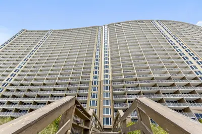 a tall building with balconies on it at Emerald Beach #1236 by Book That Condo in Panama City Beach